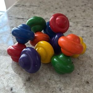 Manhattan Toy Company wooden bead rattle